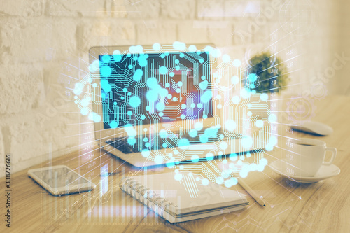Multi exposure of work space with computer and human brain hologram. Brainstorm concept. © peshkova