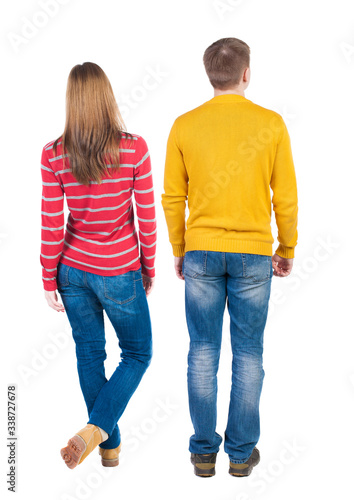 Back view couple in sweater.