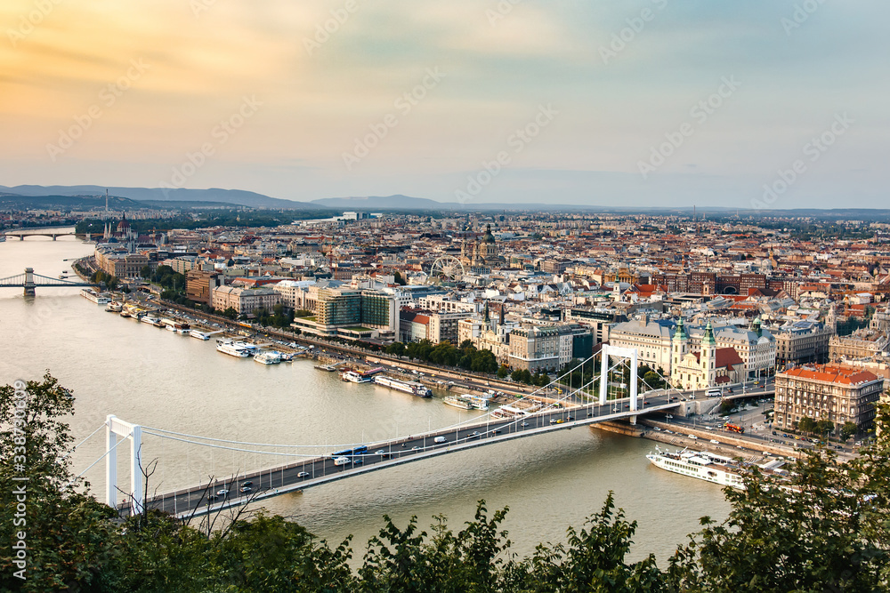 Budapest panoramic view. City, river, bridges, sunset sky.