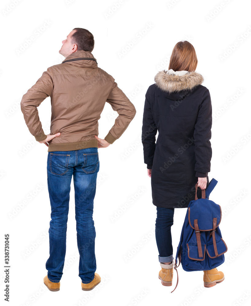 Back view of couple in winter jacket. Back view of couple in winter jacket.