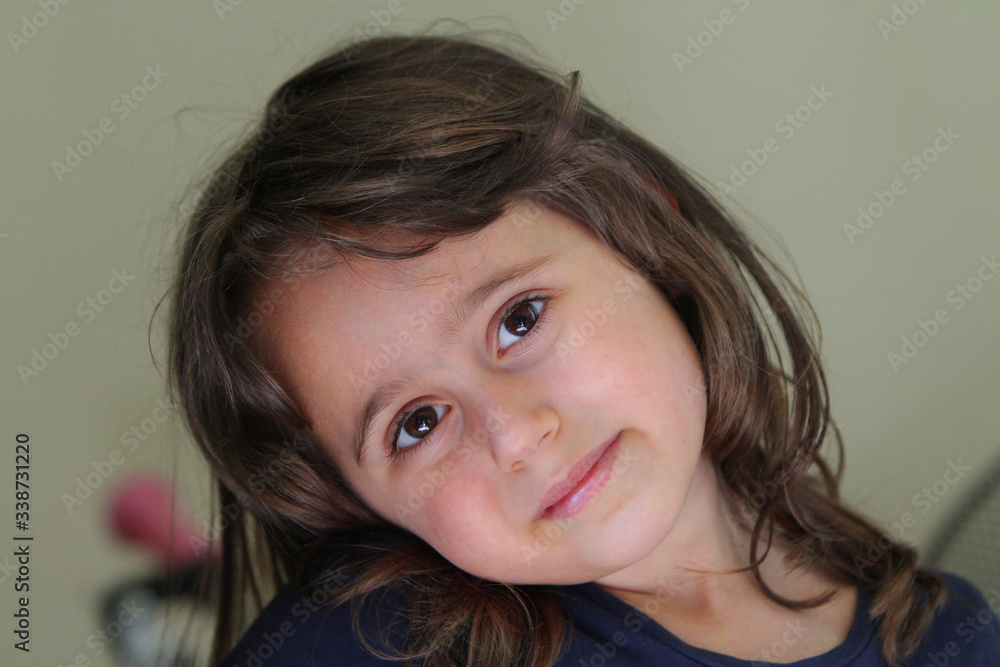 4 and a half year old girl looking at the camera 4 and a half year old girl looking at the camera