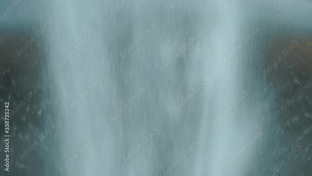Falling water on a glass surface. Rain, extreme weather, flood concepts Falling water on a glass surface. Rain, extreme weather, flood concepts