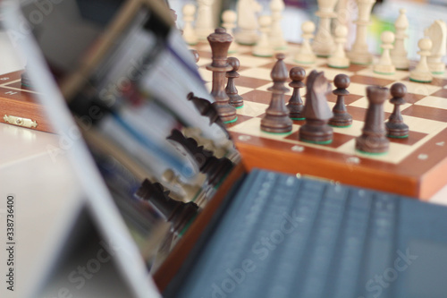 Wallpaper Mural Building the Infrastructure for the Future. Create your chess accountin internet. Goals, plans, strategy. Chess classroom, virtual tournament. Learning about the game of chess. How to win. Laptop. Torontodigital.ca