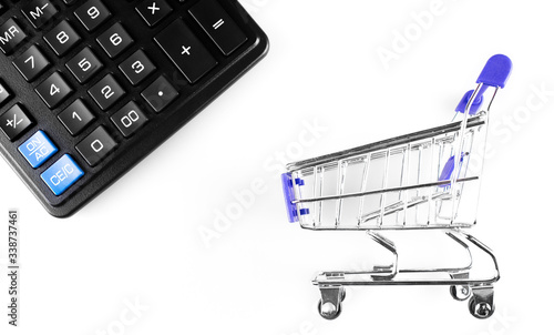 shopping cart, trolley with calculator on white background.