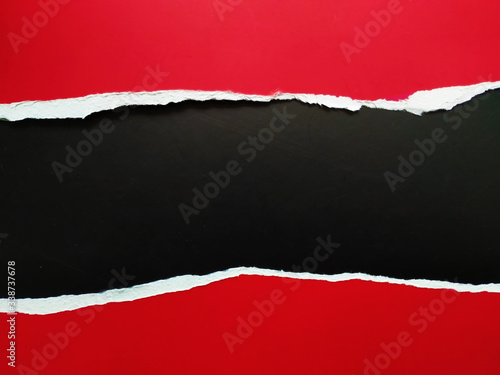 ripped paper on black background