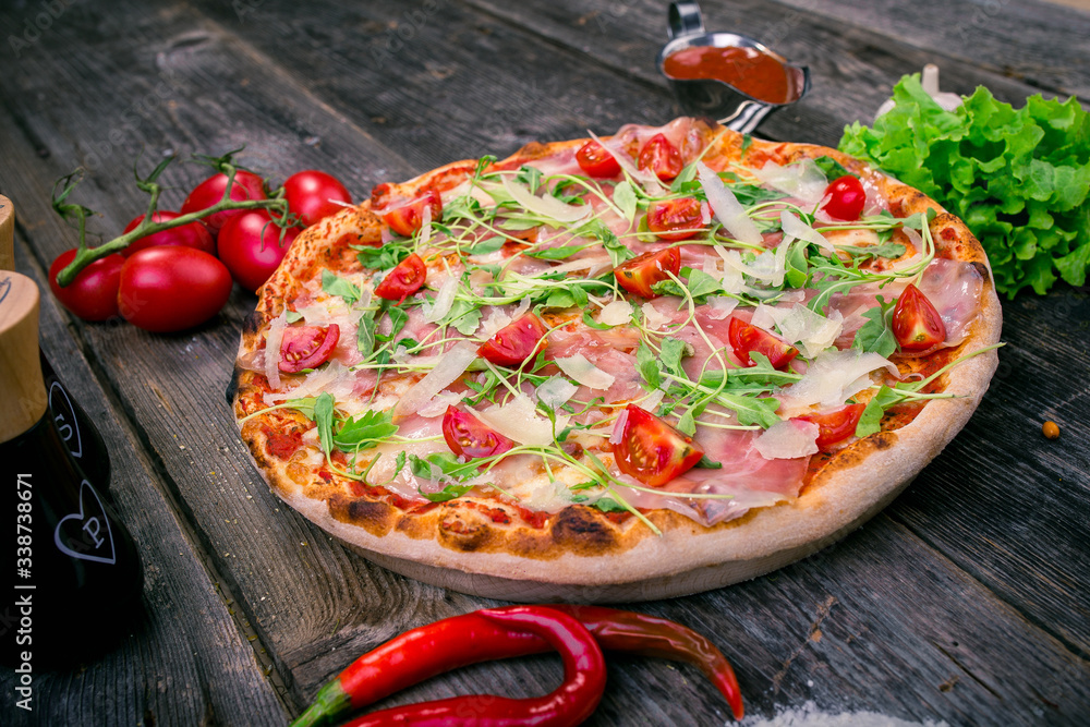 Styled Top View of Large Ham and Vegetables Pizza, Food Photography on wooden background table