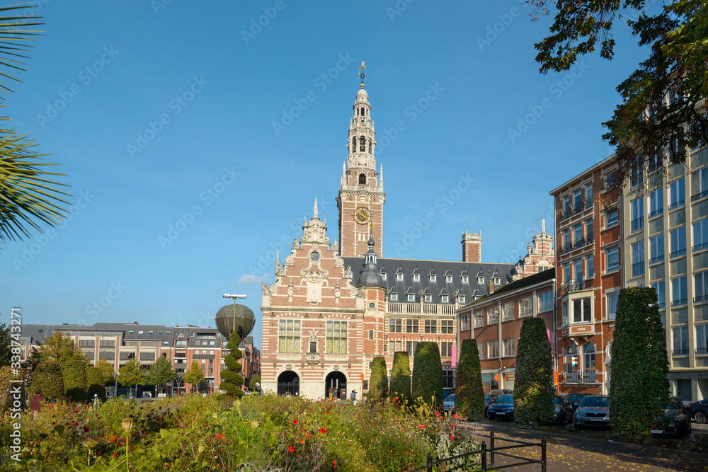 Side view (form Herbert Hooverplein) of Central Library of Catholic Library  Monseigneur on Ladeuzeplein square. Neo Flemish Renaissance style building in Leuven, Belgium