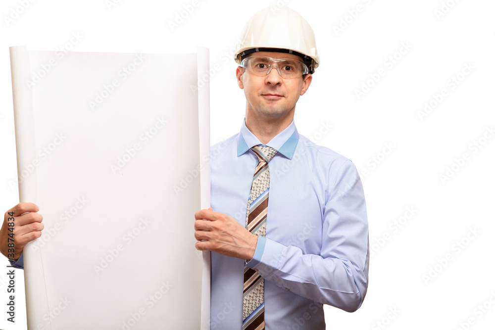a successful engineer wearing a construction helmet, glasses, shirt, tie, shows the drawings, smiles with his mouth closed. isolated a successful engineer wearing a construction helmet, glasses, shirt, tie, shows the drawings, smiles with his mouth closed. isolated