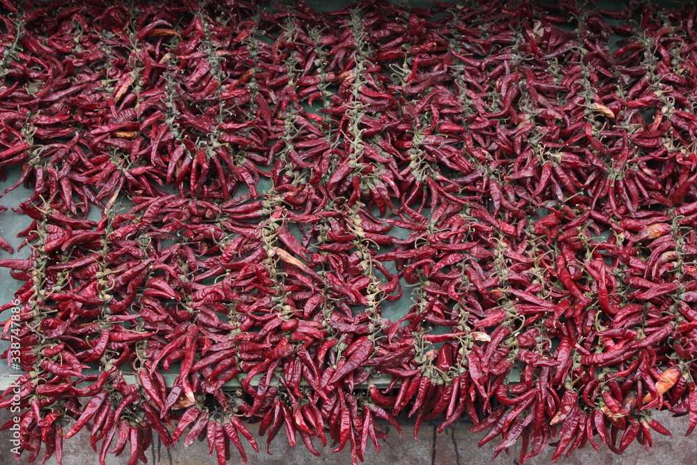 Naklejka premium table with red dry peppers