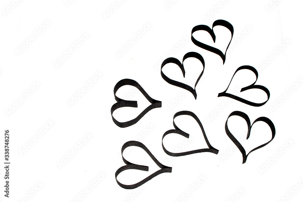 Obraz premium Black Paper Card Heart Shapes on White Background