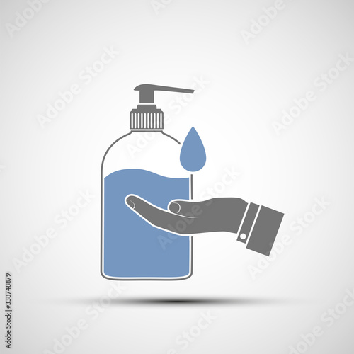 Hand sanitizer gel or soap in a bottle with dispenser.