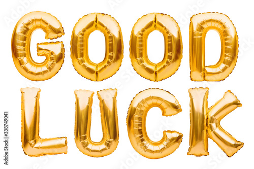 Fototapeta Words GOOD LUCK made of golden inflatable balloons isolated on white background