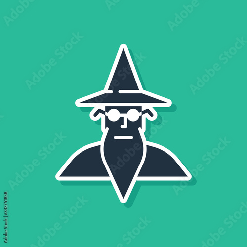Blue Wizard warlock icon isolated on green background.  Vector Illustration