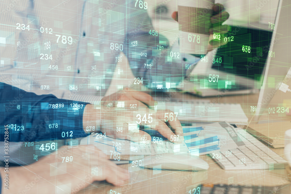 Double exposure of technology hologram with man working on computer background. Concept of big data. Double exposure of technology hologram with man working on computer background. Concept of big data.