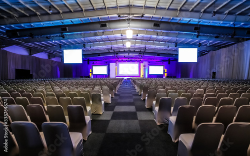 empty chairs in large Conference hall for Corporate Convention or Lecture © Sunshine Seeds