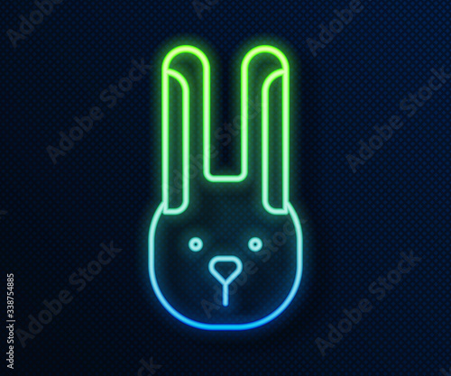 Glowing neon line Rabbit with ears icon isolated on blue background. Magic trick. Mystery entertainment concept.  Vector Illustration