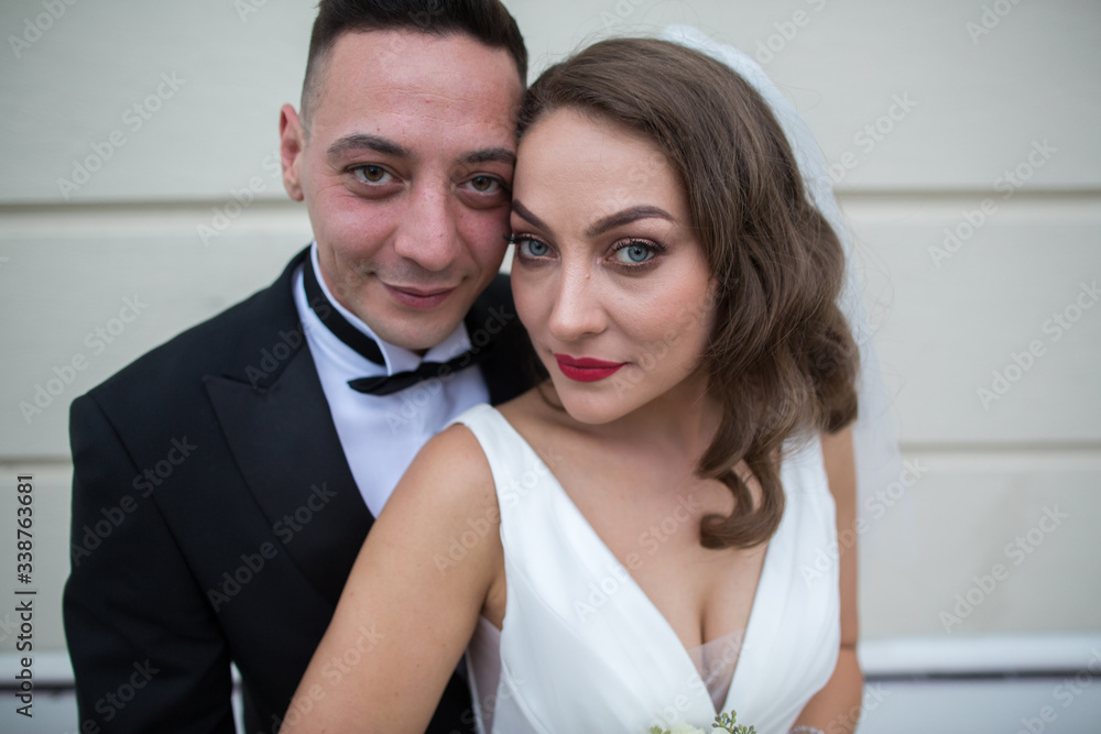 Beautiful wedding couple posing outdoor Beautiful wedding couple posing outdoor