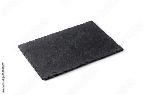 Empty black slate plate isolated on white background. 
