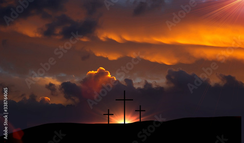 Three cross at sunset in the mountains Resurrection