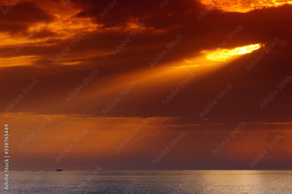 The rays of the sun over the  Corsica  mediterranean sea