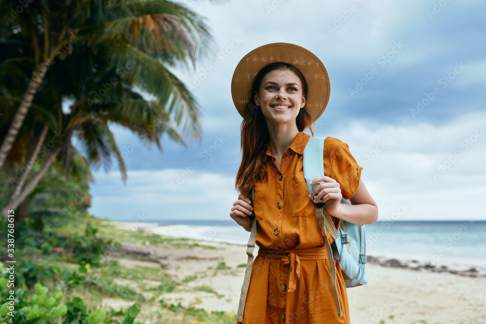 woman in a hat on the beach