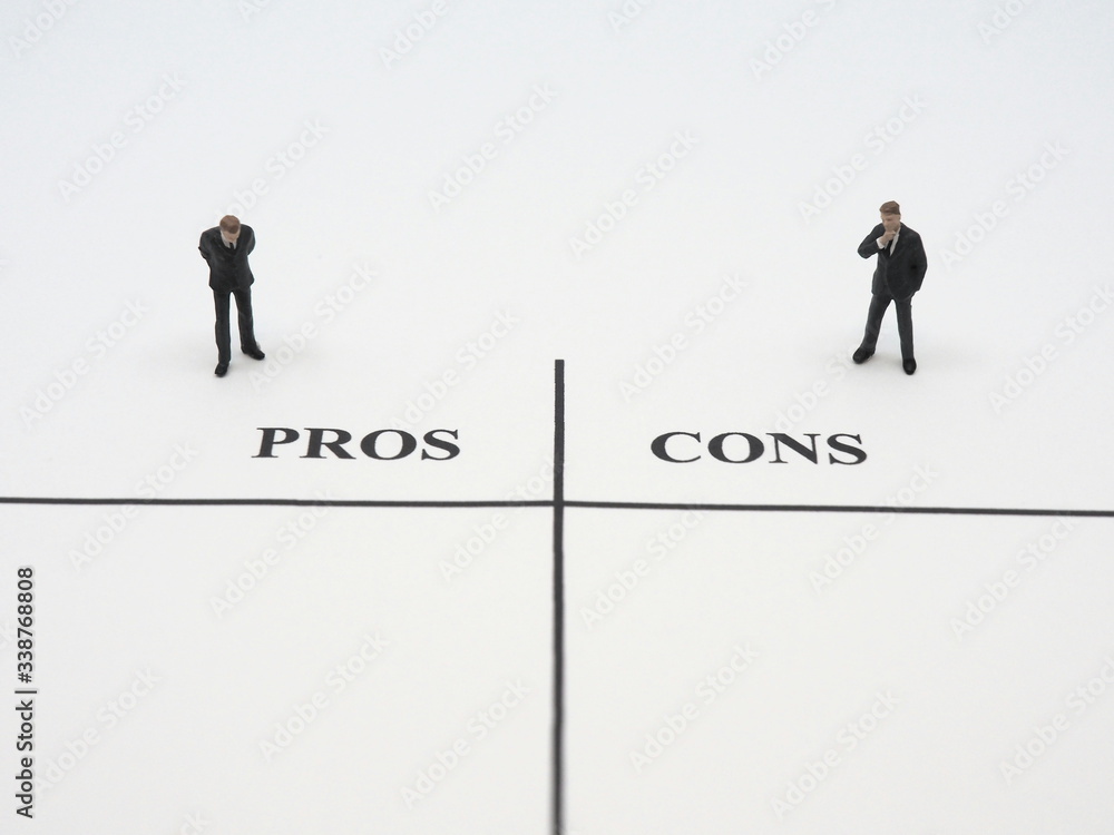 Two miniature businessmen thinking about pros and cons. Two miniature businessmen thinking about pros and cons.