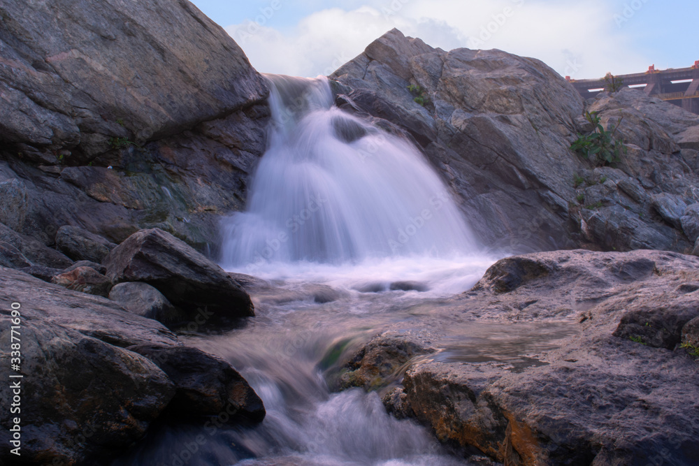 long exposure image of a waterfall long exposure image of a waterfall