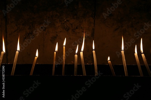 Obraz na płótnie Candles Burning At Church Of The Holy Sepulchre