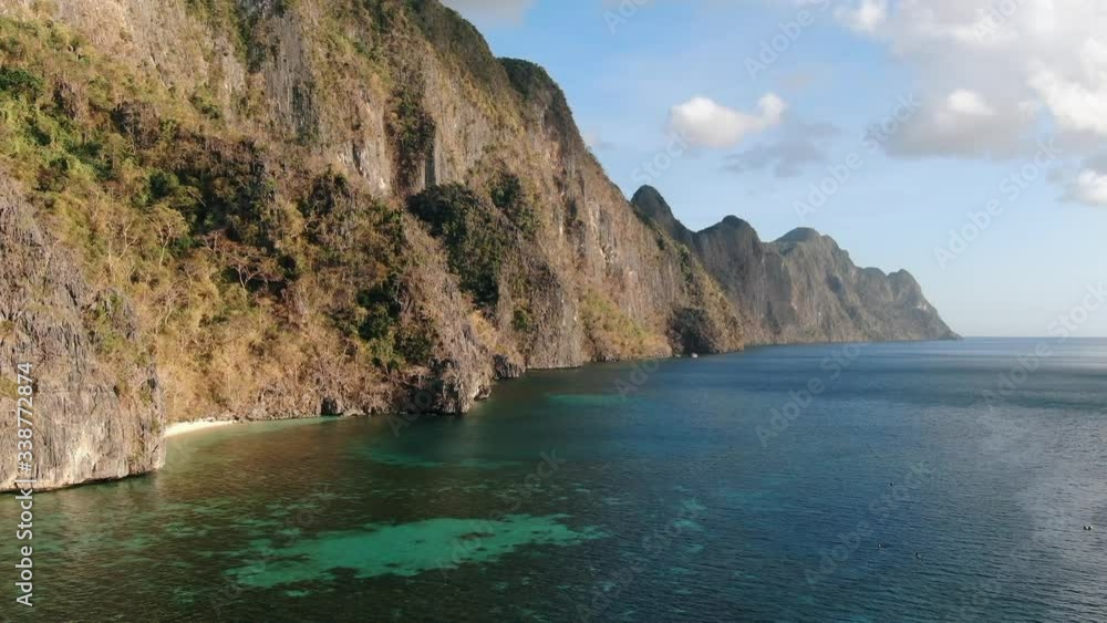 Drone shot zooming into mountain side in the Philippines Drone shot zooming into mountain side in the Philippines