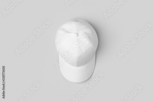Photography White baseball cap mockup on a grey background.