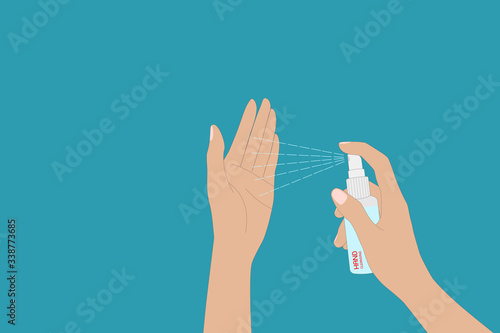 female use hand cleansing spray for clean hands on blue  blackground 