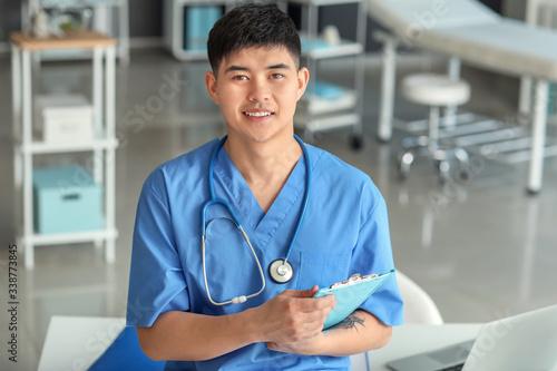 Male Asian doctor in clinic