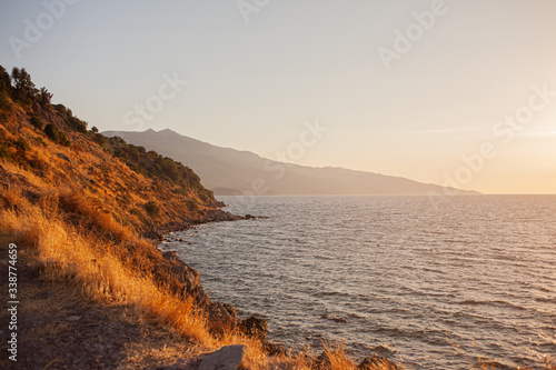maritime landscape of cliffs at sunset in the mediterranean
