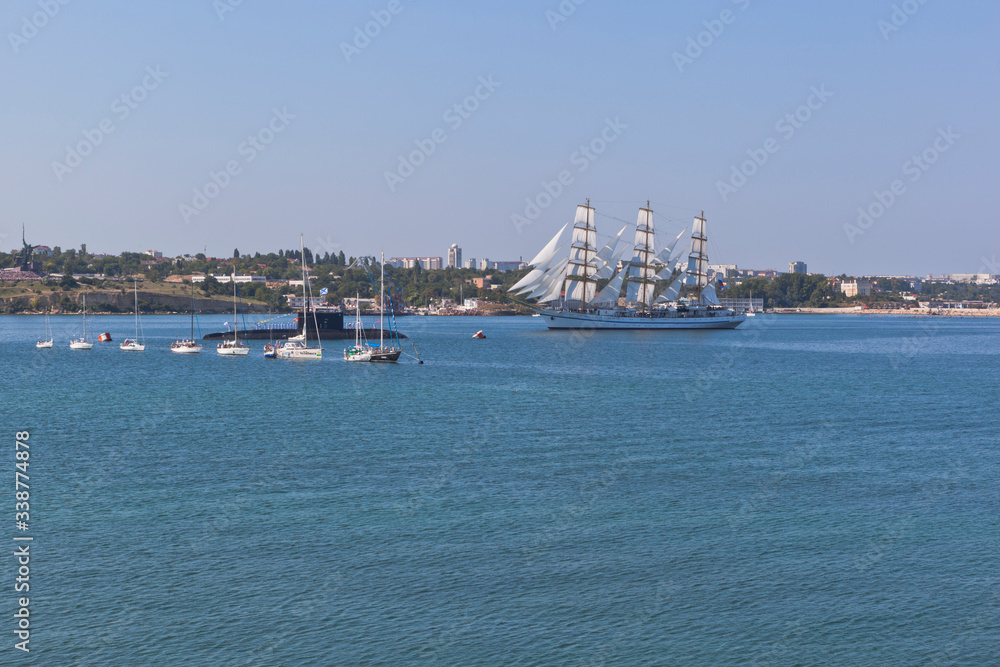Sailboat Khersones enters the Sevastopol Bay at the parade in honor of the Navy Day, Crimea