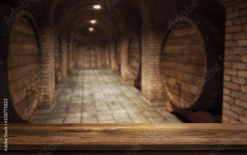 Empty wooden table with blurry background wine barrels in the wine-vault. Winery and beverage concept. 3D rendering - 3D Illustration. Mixed media.