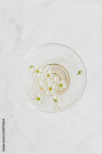 flowers in coupe champagne glass