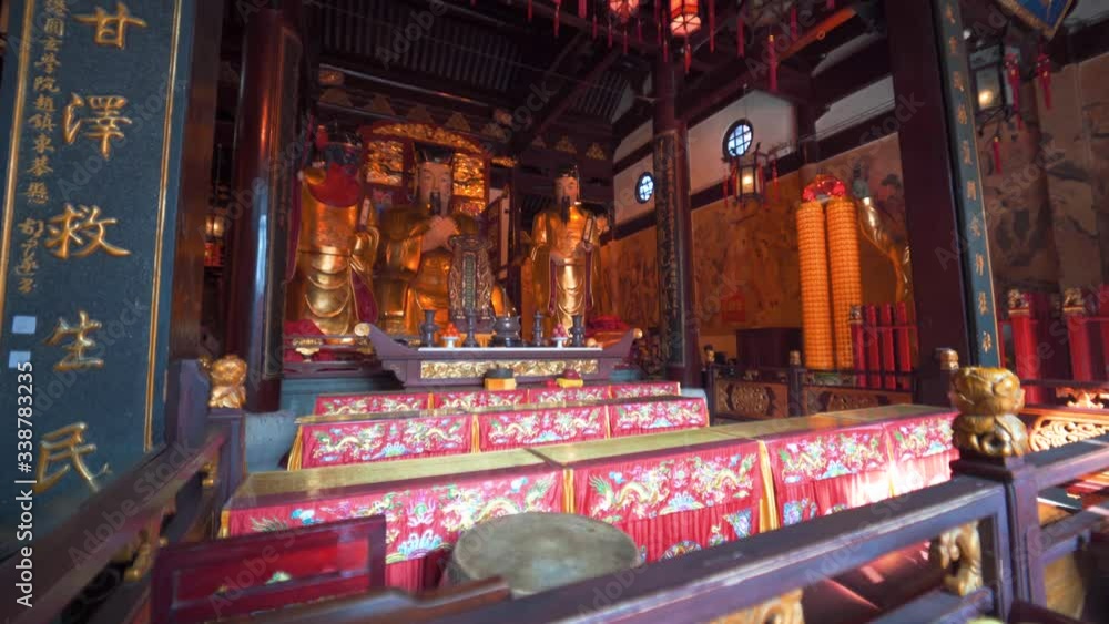 Empty Buddha temple with no people praying or worshiping, Old Town, Shanghai, China Empty Buddha temple with no people praying or worshiping, Old Town, Shanghai, China