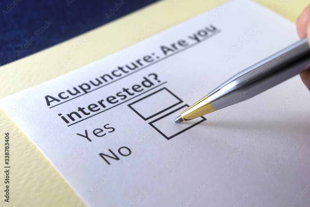 One person is answering question about acupuncture. One person is answering question about acupuncture.