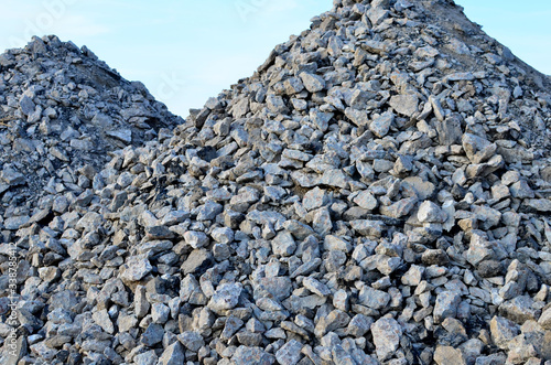 Recycled concrete aggregate (RCA) which is produced by crushing concrete reclaimed from concrete buildings, slabs, bridge decks, demolished highways. Disposal of concrete in landfill. photo