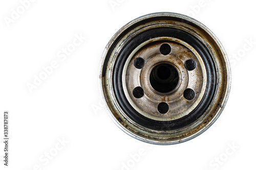 Old and dirty oil filter isolated on white background.Copy space