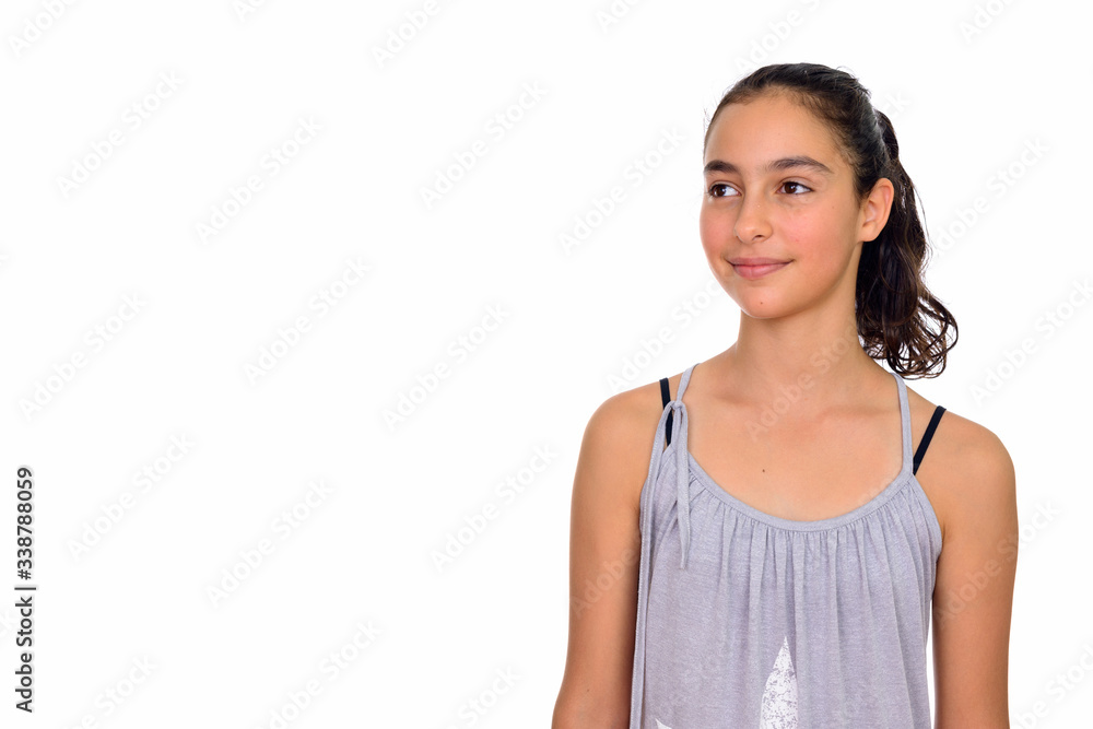 Studio shot of young beautiful teenage girl isolated against white background Studio shot of young beautiful teenage girl isolated against white background