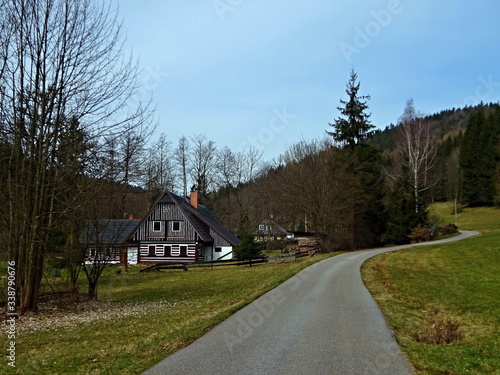 Fotografija Czech Republic - view of wooden house in Antonin valley in spring near town Svob