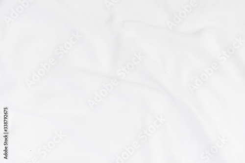 Abstract white fabric texture background. Wavy white cloth. 