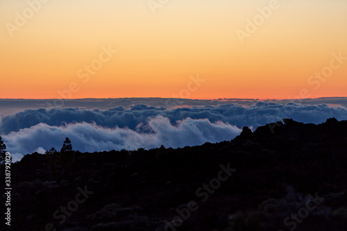 Detail of the clouds under the mountain during a sunset in Teide mountain, Tenerife, Canary Islands, Spain