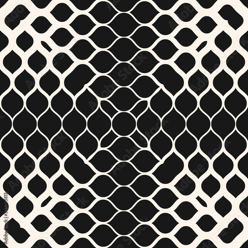 Vector geometric halftone seamless pattern with small fading shapes, petals, leaves, mesh. Black and white color. Abstract background texture with gradient transition effect. Monochrome repeat design