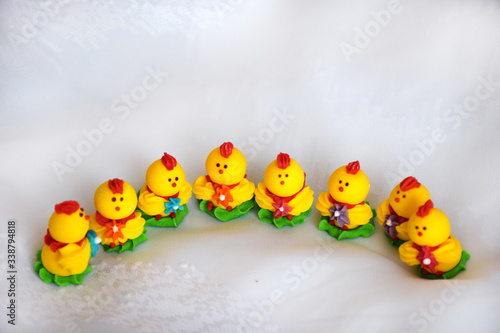  Easter concept with space for text, greeting card. Easter chickens on white background with copy space. © Iris_AN