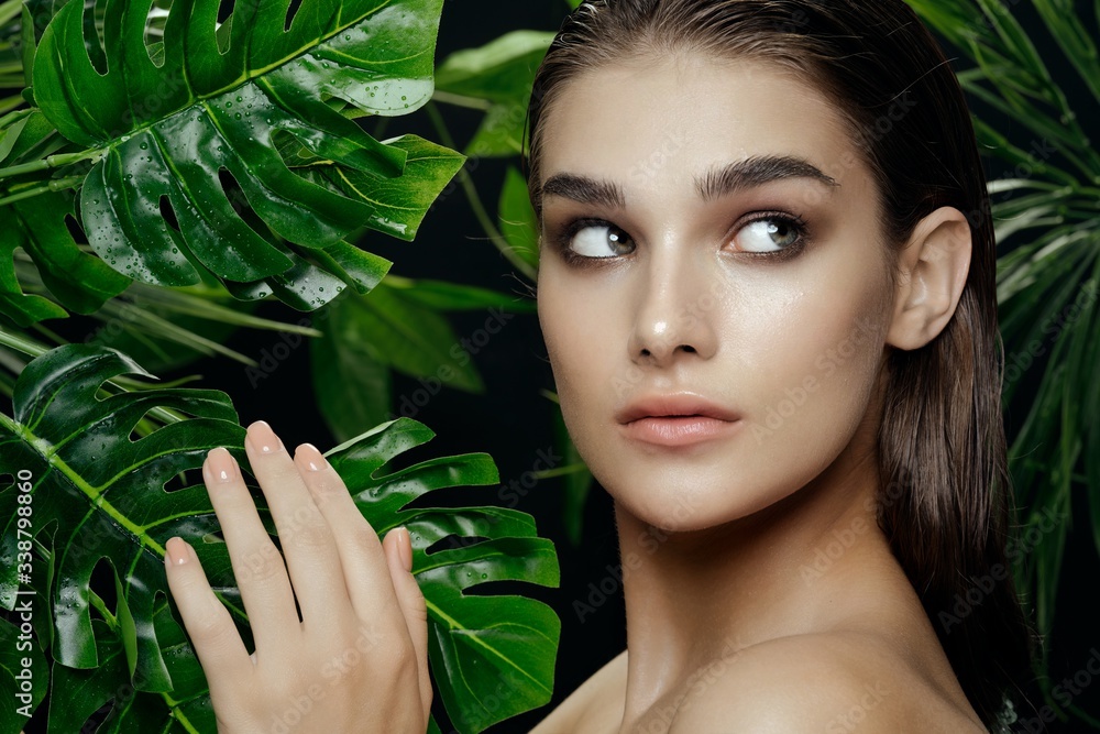 beautiful woman green leaves charm tropics beautiful woman green leaves charm tropics