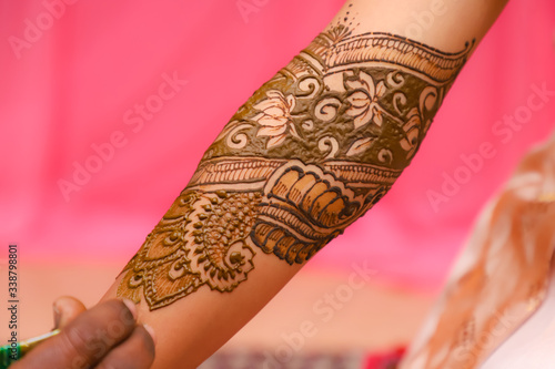 Indian bridal hand with mehandi design