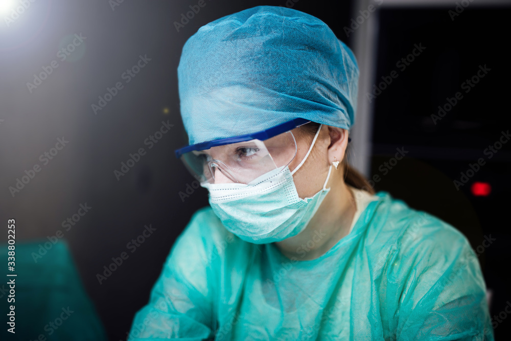young intern girl in a medical uniform and glasses. portrait of a doctor. young intern girl in a medical uniform and glasses. portrait of a doctor.