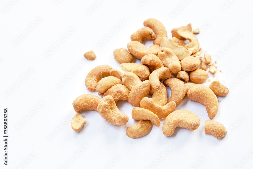 roasted salty cashew nuts arranging on white background roasted salty cashew nuts arranging on white background
